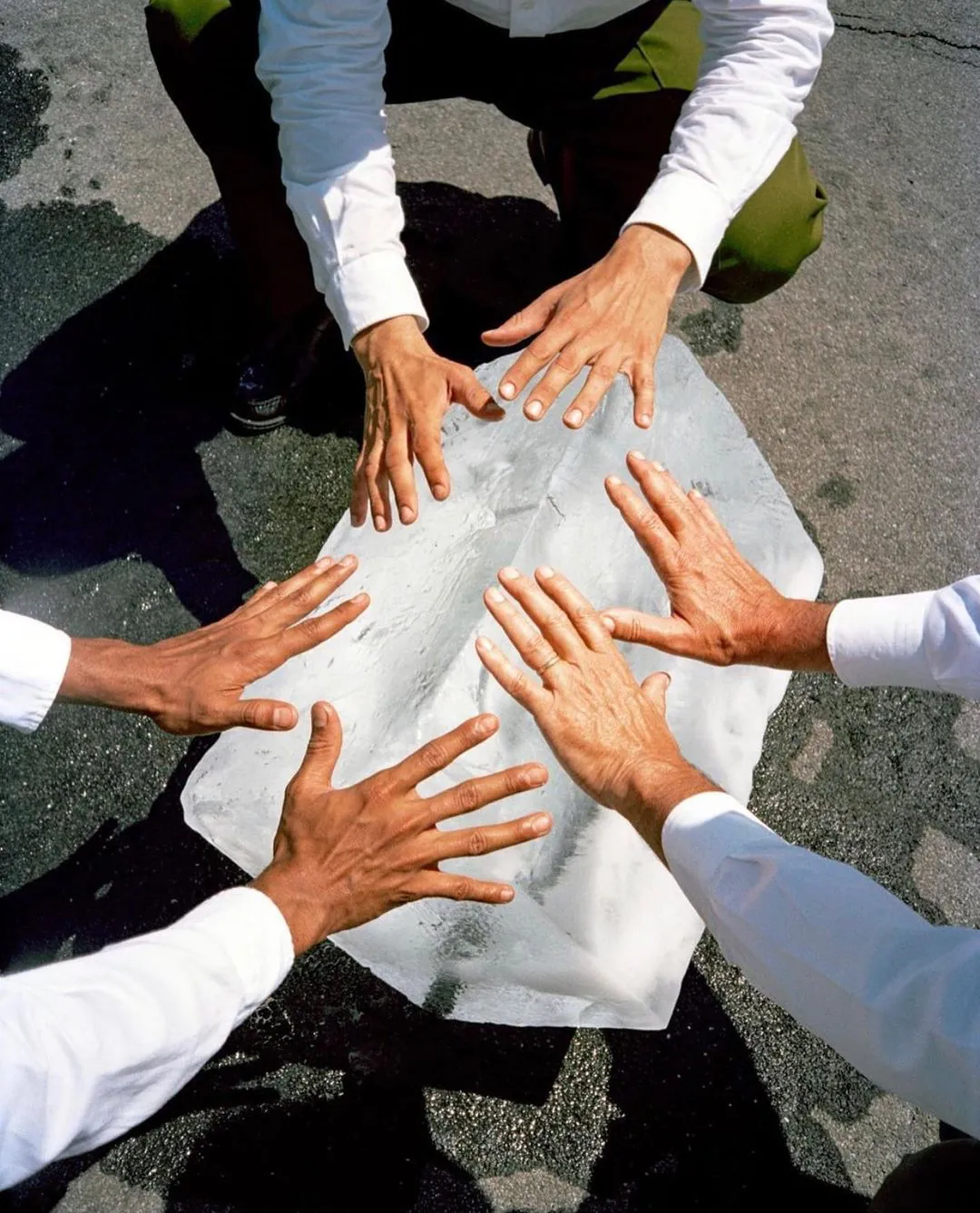 Hands reaching together